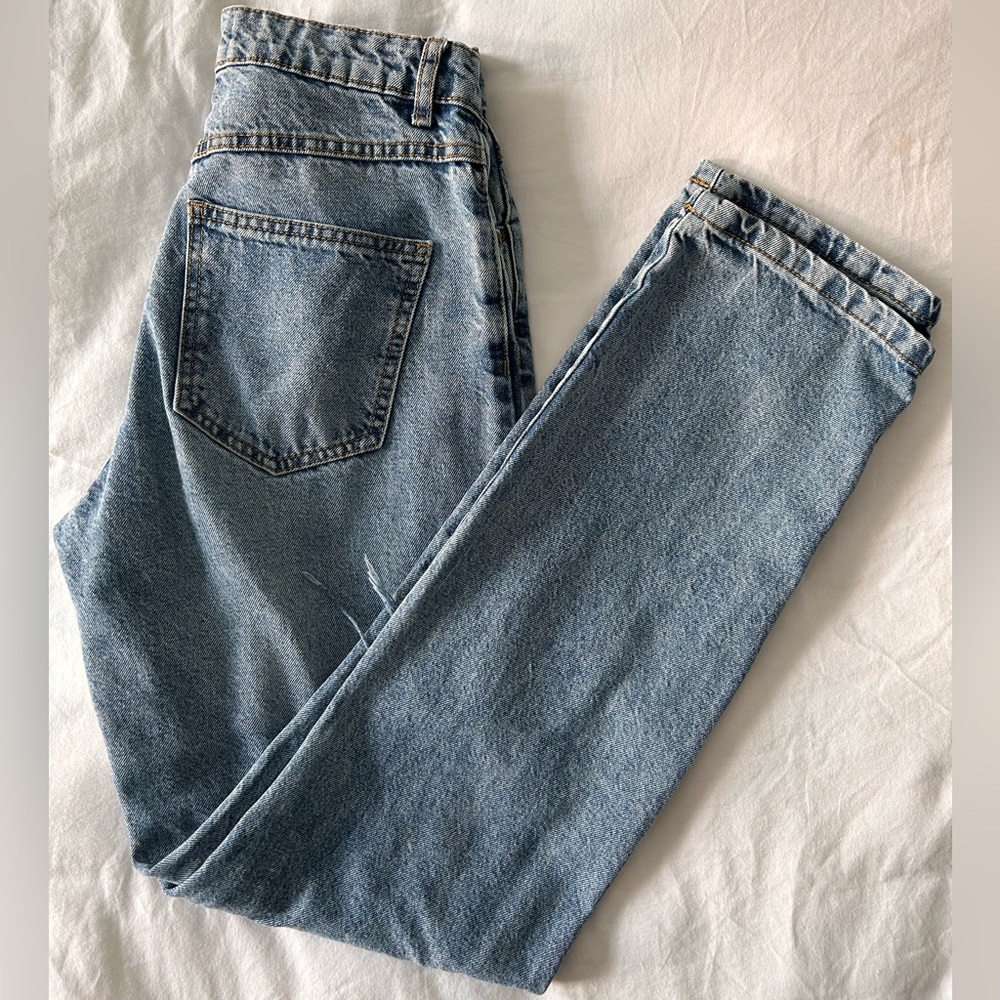 Blue distressed jeans